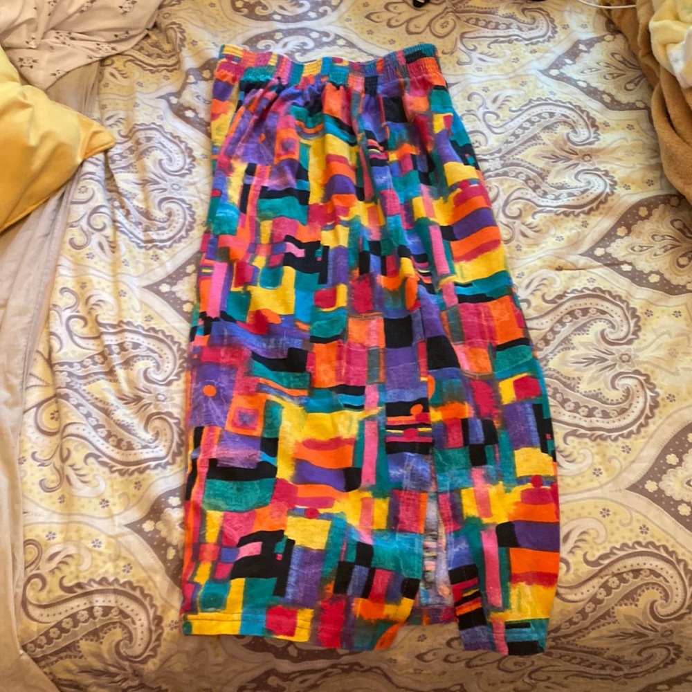 Long, vintage skirt. Has a slit at the bottom